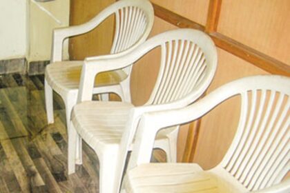 Rain water accumulated on chairs inside the South Goa Zilla Panchayat office.