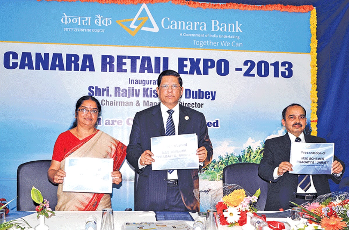 Rajiv Kishore Dubey, CMD, Canara Bank (centre) launching the two new products, Canara MSE Pragati and Canara MSE Unnati in the presence of  G K Maya, Dy GM and R R Sharma, CGM at the Canara Bank Retail Expo 2013 in Panjim on Wednesday.