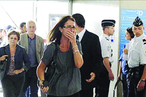 Relatives of passengers arrive at the crisis center on Monday at the Charles-de-Gaulle airport in Roissy, northern suburb of Paris.