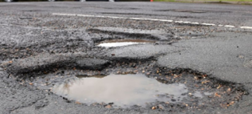 Repair Sattari potholes or will celebrate Ganesh festival at Roads Department: Cong 1 Repair Sattari potholes or will celebrate Ganesh festival at Roads Department: Cong