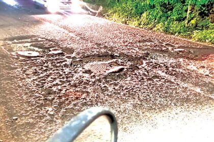 Repair huge potholes on District hospital road