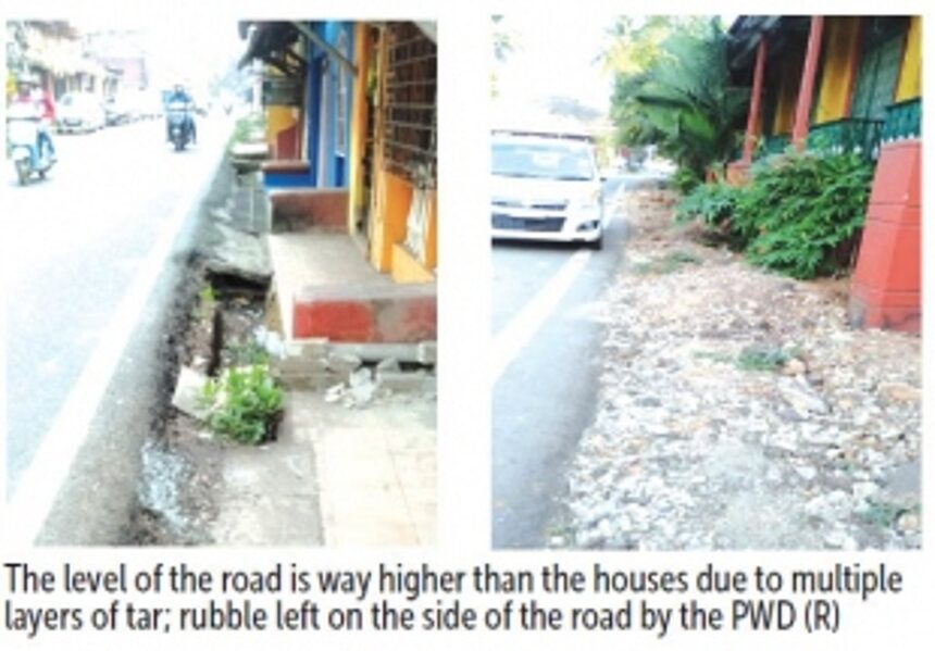 Rise in height of Abade Faria Road, open gutters & rubble plague residents