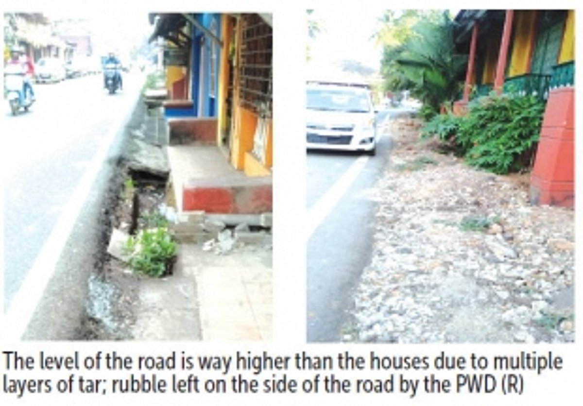 Rise in height of Abade Faria Road, open gutters & rubble plague residents