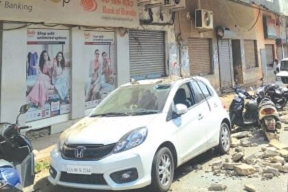 Rubble from crumbling building in market area comes crashing down