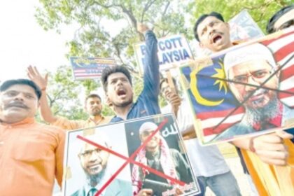 Ruling party of Malaysia defends PM decision not to deport him to India