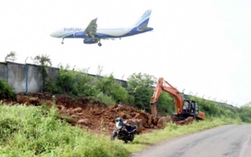 SECURITY BREACH? Excavator digging along airport wall but authorities clueless 1 SECURITY BREACH? Excavator digging along airport wall but authorities clueless
