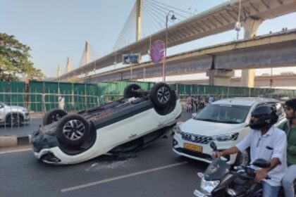 SUV Overturns Near Multi-Level Car Park in Patto, Causes Traffic Jam