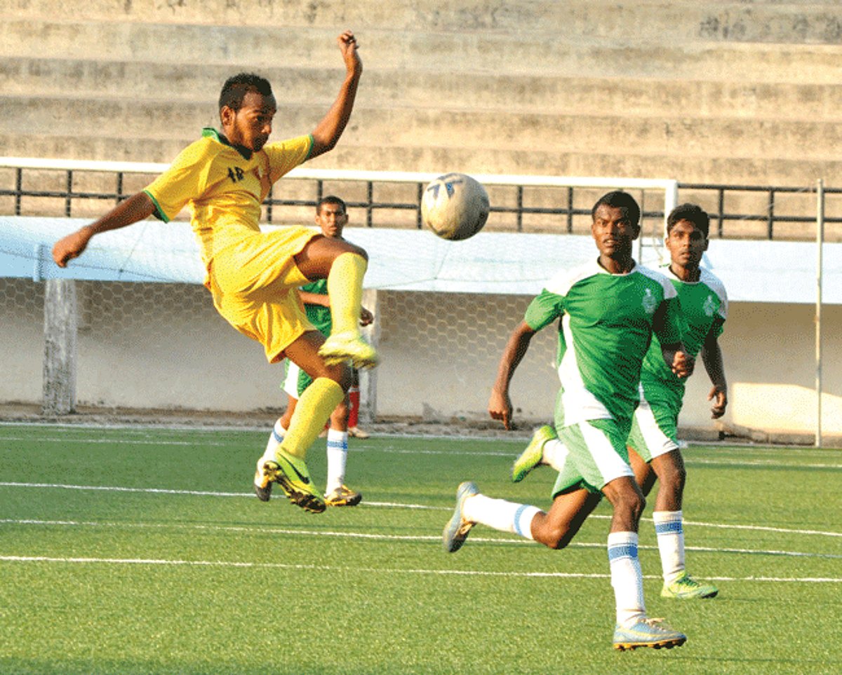 Salcete Football Club player takes an acrobatic kick against Goa Police at Duler stadium, Mapusa, on Wednesday.