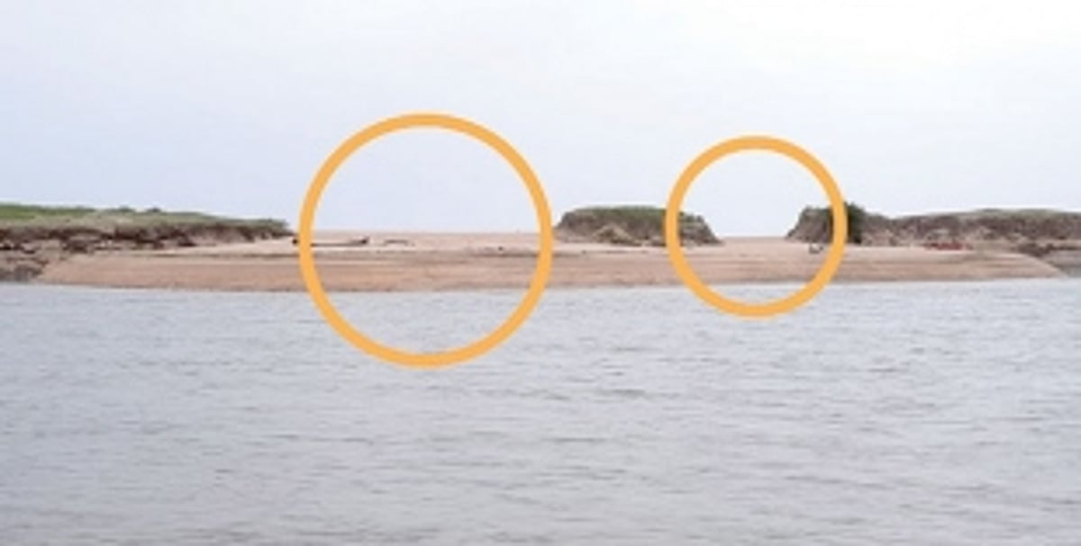 Sandbar on Galgibaga River partially  washed away due to swelling of sea
