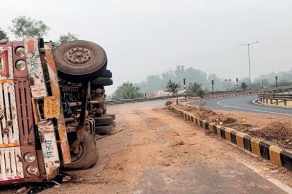 Scanner on road alignment as truck flips over at Dhavalim