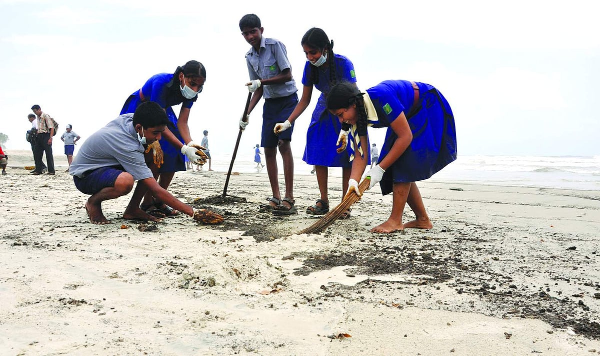 School students engaged in the beach cleaning exercise at the Colva beach on Wednesday.