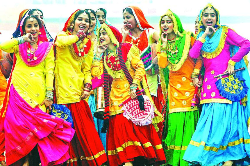 Schoolgirls perform a traditional Punjabi folk dance, the 'Giddha' during Republic Day celebrations at Guru Nanak Stadium in Amritsar on Monday.