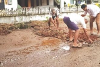 Senior citizens  ‘repair’ Kopardem potholed road