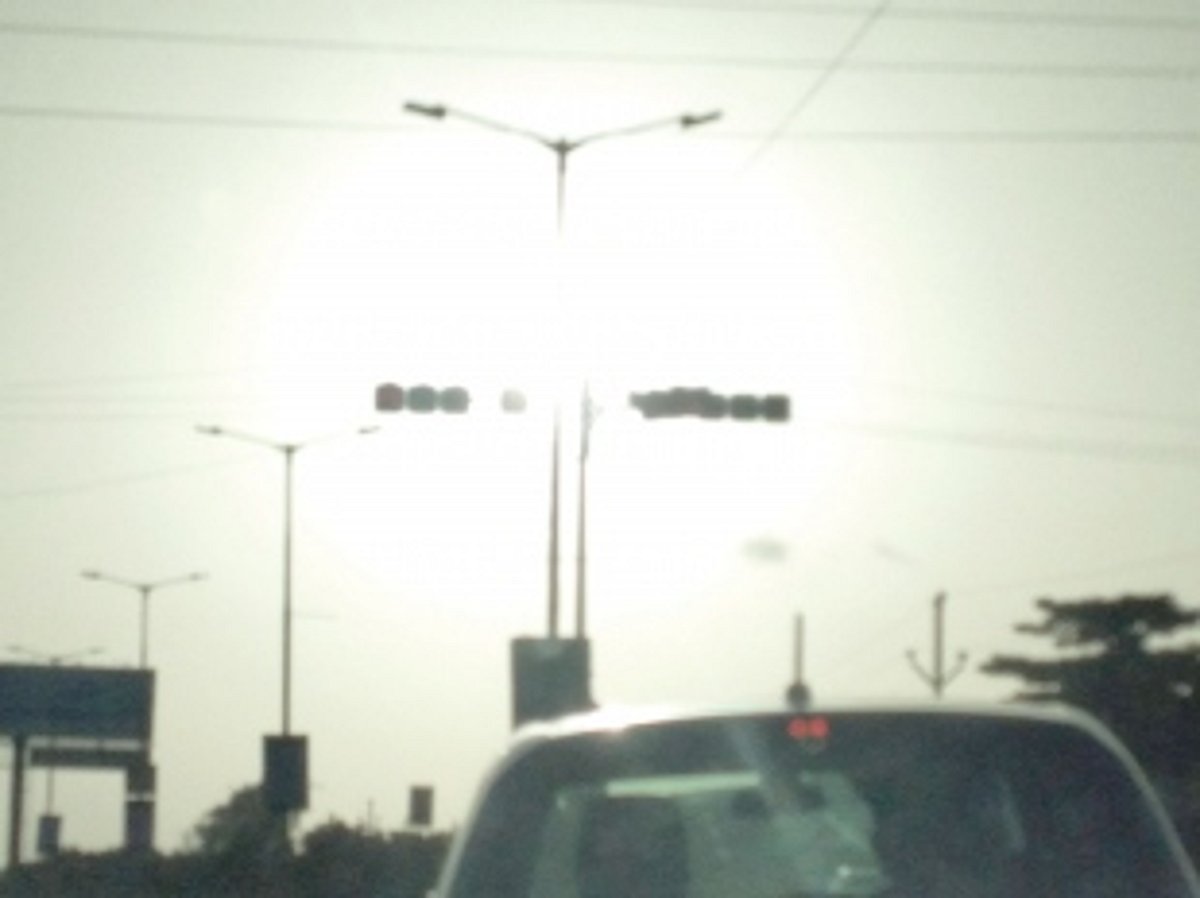 Signals at MES junction in line  with setting sun not clearly visible