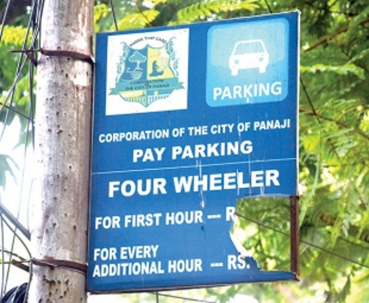 Signboards indicating parking rates torn in city; activists, public smell a rat
