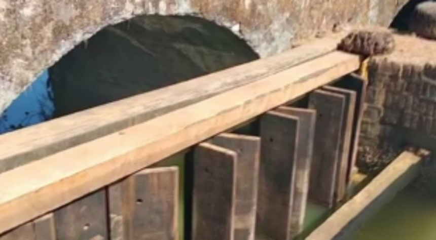 Sluice gates breach leaves fields inundated at Salvador do Mundo