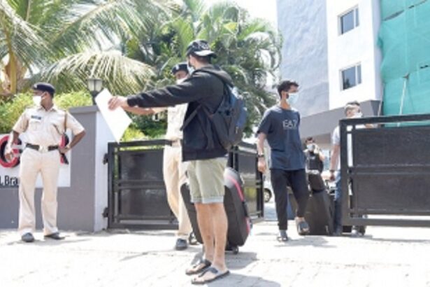 Smiling and frowning seafarers drive from institutional to home quarantine