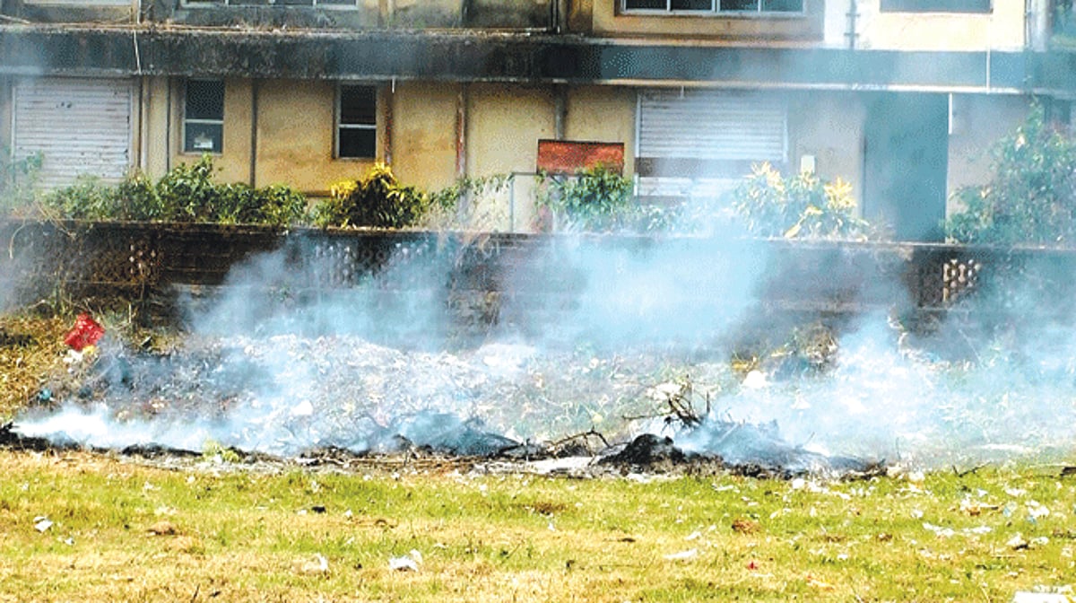 Smoke billowing from the acquired land for the proposed non-convention energy park after the waste was set afire by civic workers.