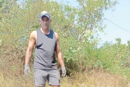 Social activist collects empty beer bottles, dumps them in front of municipal building