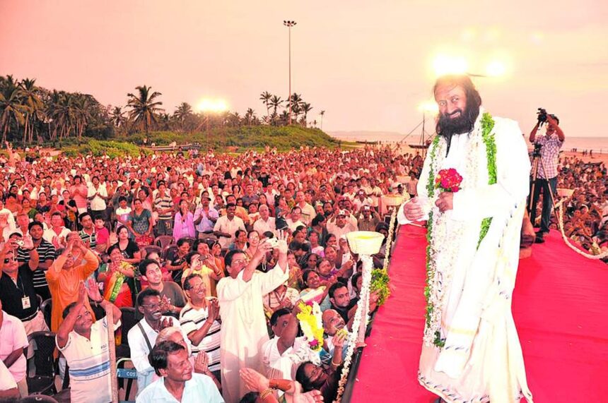 Spiritual leader Sri Sri Ravi Shankar addressing his followers at the Colva beach on Saturday.