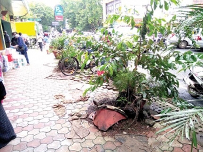 Spruce up City footpath  on 18th June Road