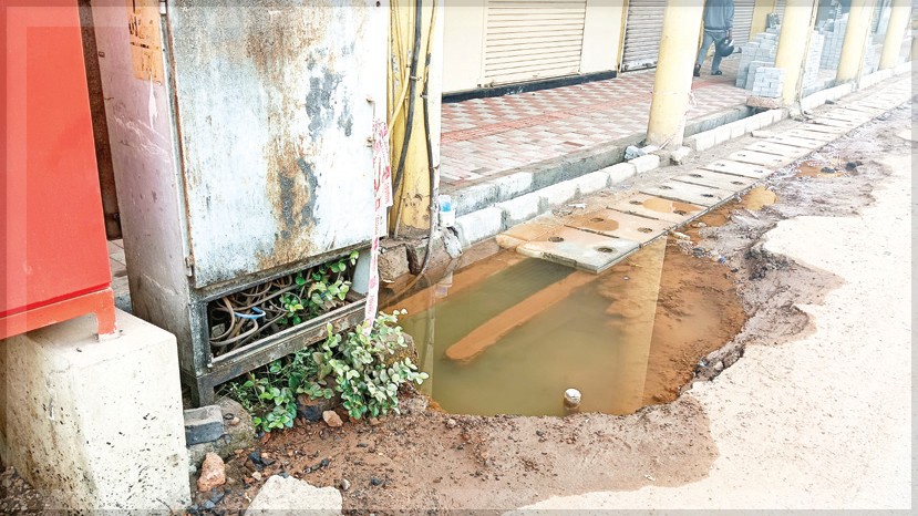 Stagnant Water Near Ferry Point Raises Health Concerns for Commuters and Shopkeepers