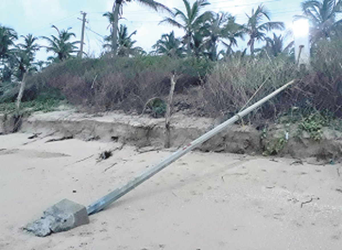 Streetlight pole uprooted  at Sernabatim Beach
