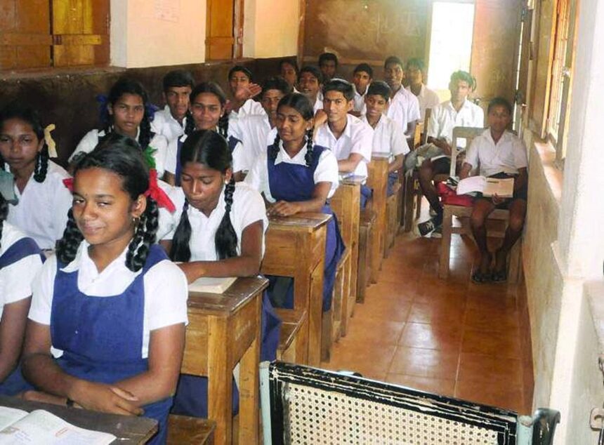 Students of Government Primary School, Kudchirem seen studying in the verandah of the school.                Photo by Vishant Vaze