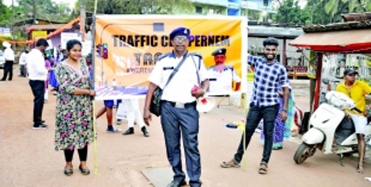 Students put up traffic awareness float at Pernem Shigmo Parade