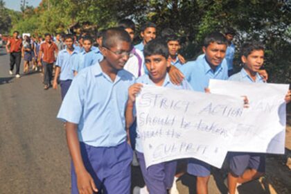 Students take part in a protest rally demanding the immediate arrest of the accused in Vasco.