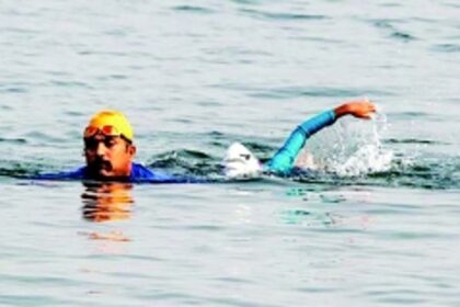 Swimming across the Mandovi