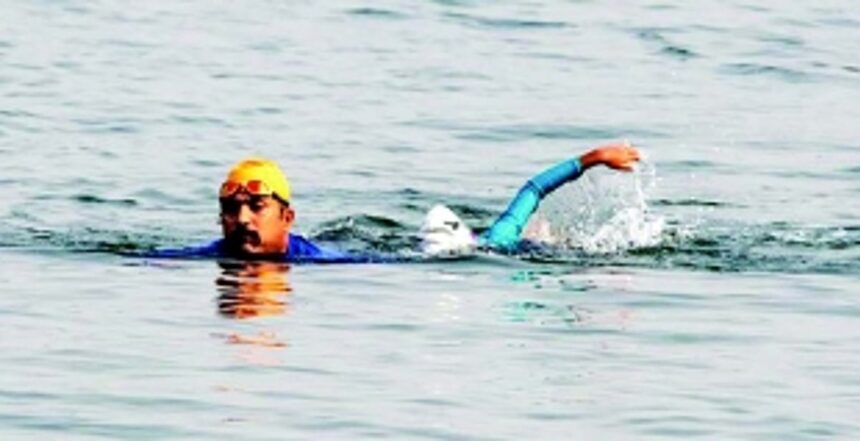 Swimming across the Mandovi