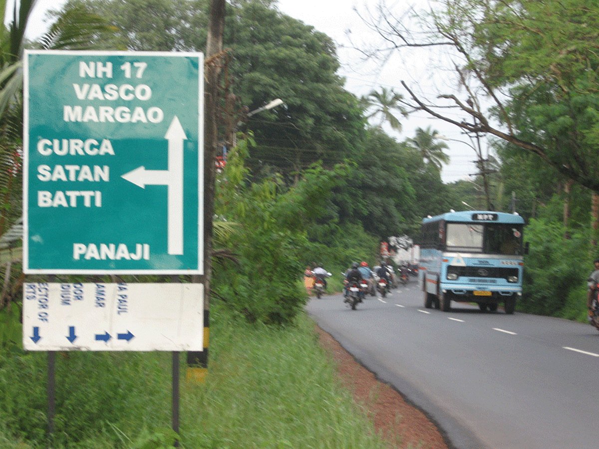 THIS WAY FOR THE DEVIL: This signboard says turn left for 'SATAN'. Will this latest howler take its maker straight to Hell?