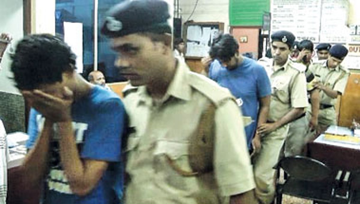 The accused tourists being taken by the Colva police for remand on Monday.
