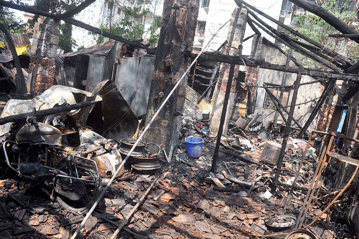 The charred remains of the vehicles which were burnt in inferno on Thursday.