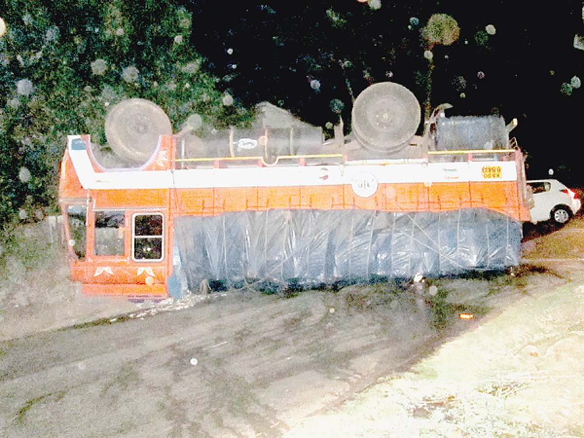 The fish-laden truck turned turtle at Char-Rasta.