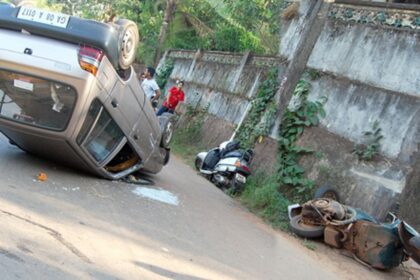 The ill-fated Maruti car lying turtle on the road after it rammed against the two scooters at Deussua-Chinchinim.