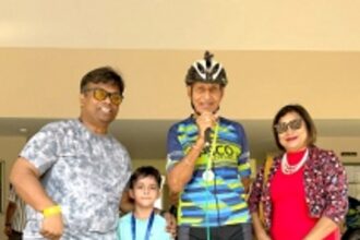 The indefatigable fighter cycling  and making his own way