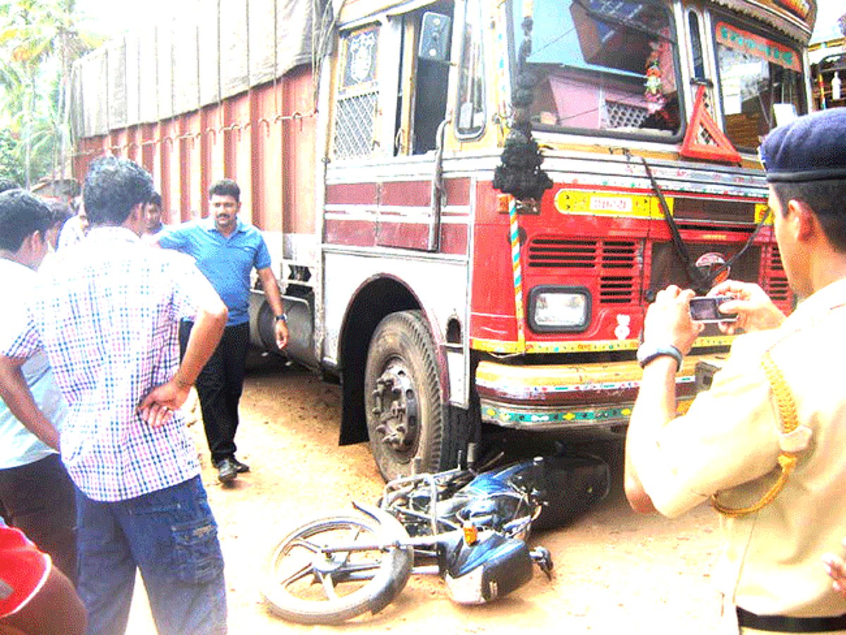 The parked two-wheeler crushed under the wheels of a truck at Chaudi.