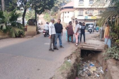 The road behind Milagres Church in Mapusa is riddled with potholes; poses danger to commuters