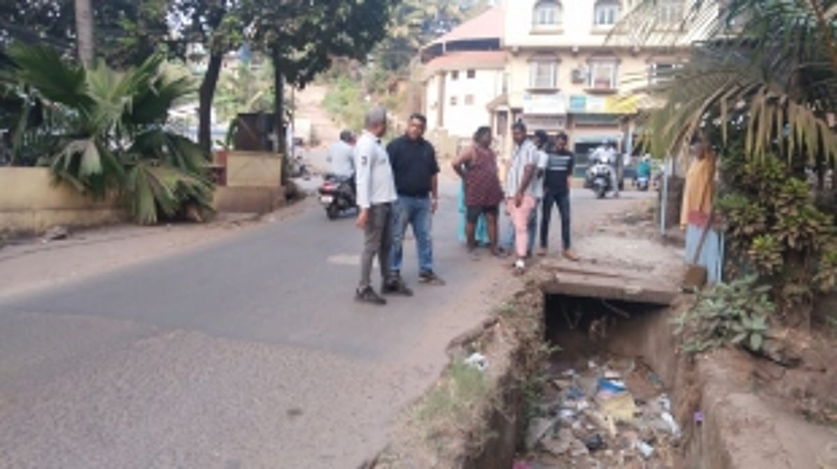 The road behind Milagres Church in Mapusa is riddled with potholes; poses danger to commuters