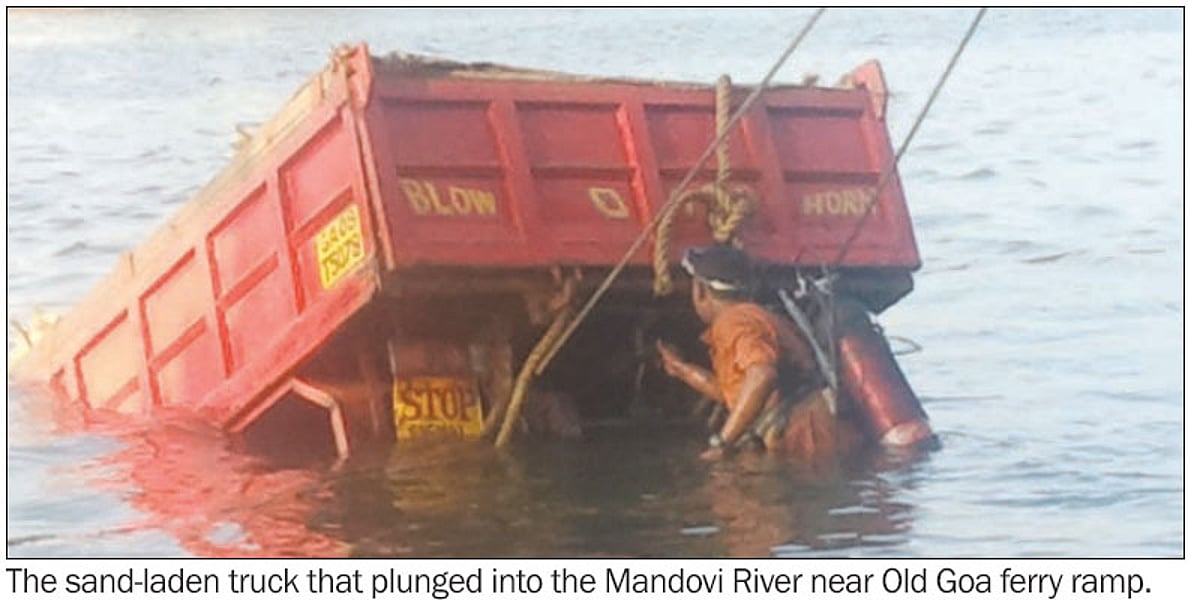 The sand-laden truck that plunged into the Mandovi River near Old Goa ferry ramp.
