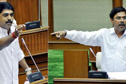 Tourism Minister Dilip Parulekar in a verbal discussion with Fatorda MLA Vijai Sardessai