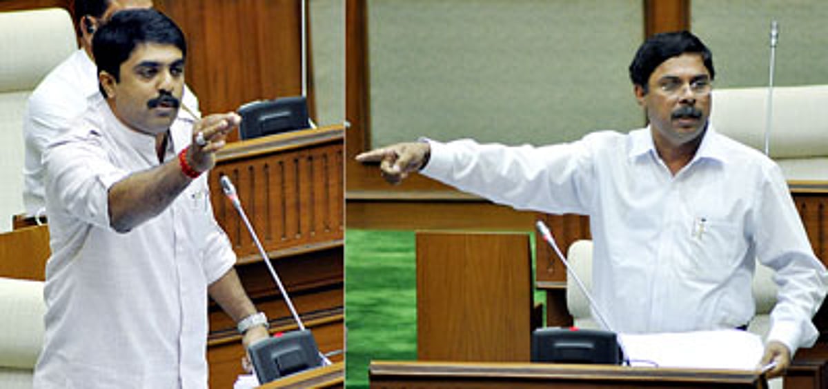 Tourism Minister Dilip Parulekar in a verbal discussion with Fatorda MLA Vijai Sardessai
