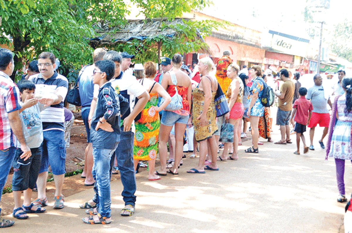 Tourists near the entry point at Collem wait for their turn to go to Dudhsagar waterfall.