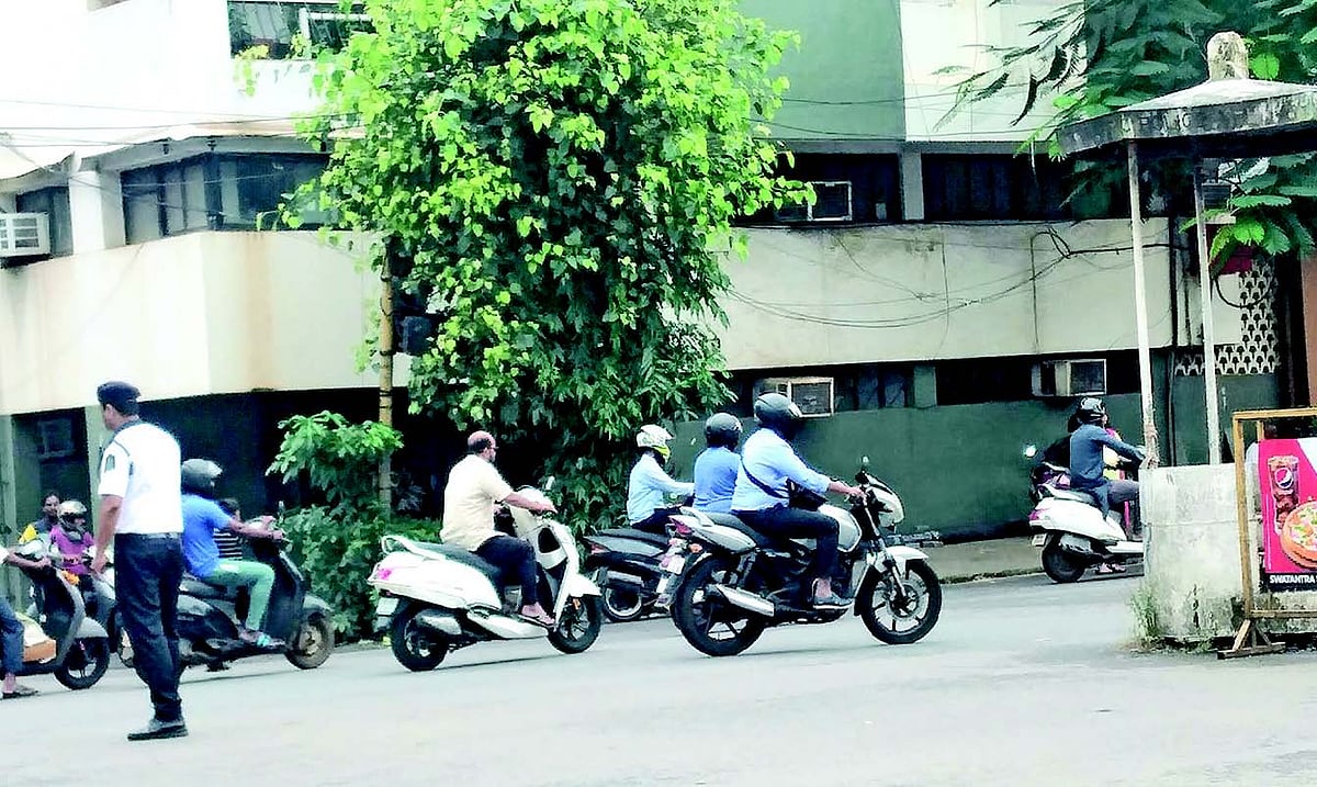 Traffic cops working in trying conditions