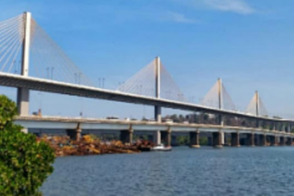 Troubled bridge over placid waters