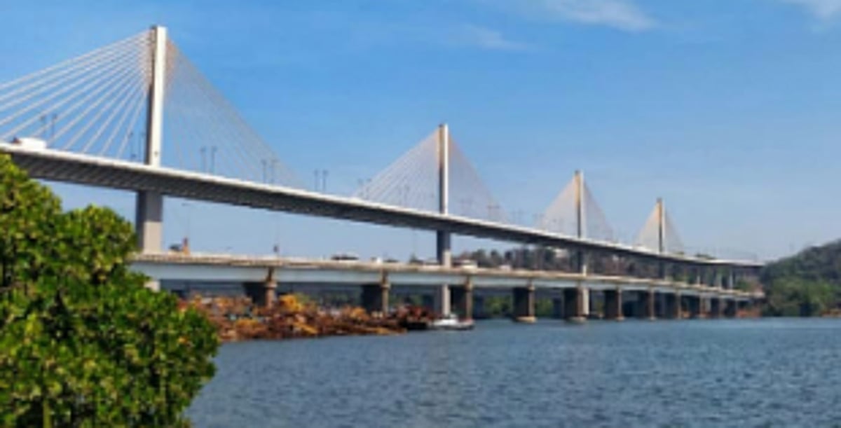 Troubled bridge over placid waters