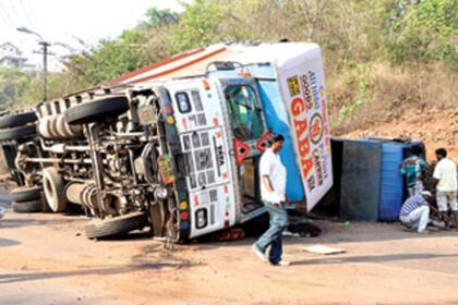 Two goods carrier trucks fell on their side disrupting vehicular traffic