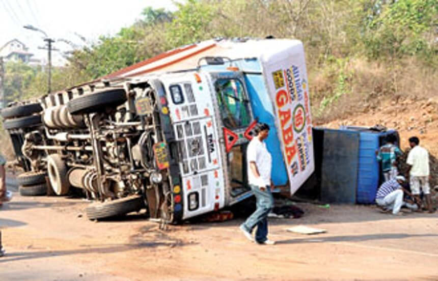Two goods carrier trucks fell on their side disrupting vehicular traffic